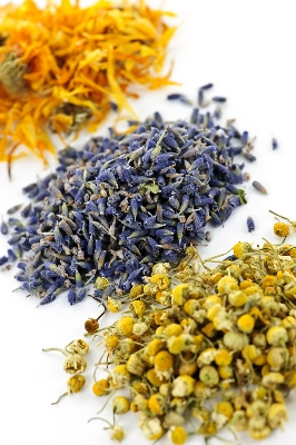 Dried flowers and tea botanicals arranged in a flatlay